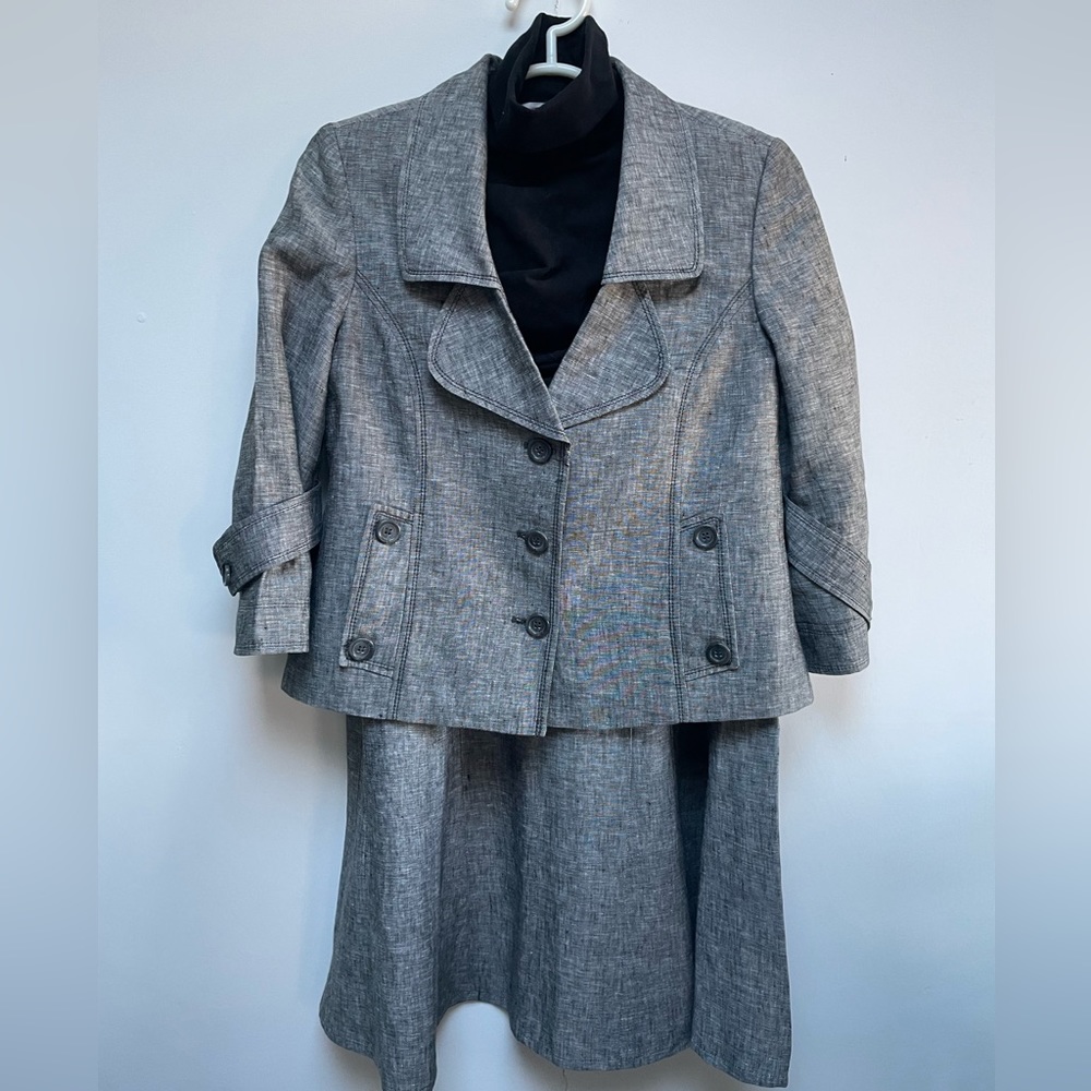 Unique three piece linen suit with three quarter sleeves and button tab trim
